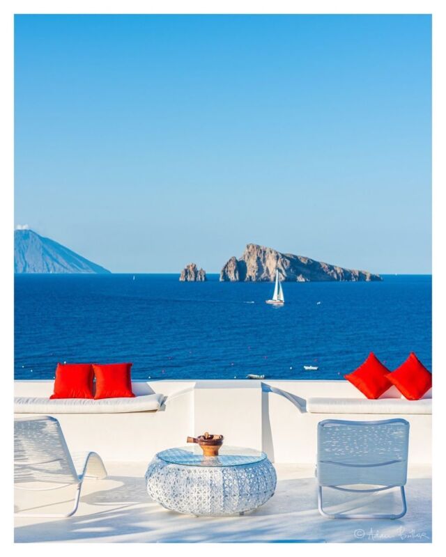 This is real life. 📸 by @adambutlerphotography 
At one of the most beautiful views in the world. 
Have you been to Panarea? Or any of the other Aeolian Islands?  This is your view to go!

#aeolianislands #sicily #italy #loves_sicilia #ig_sicily #igersitalia #loves_madeinitaly #ig_italy